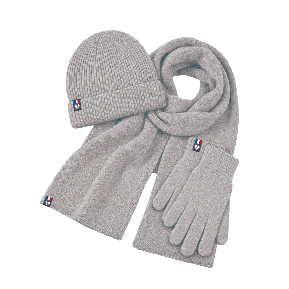 Ensemble bonnet, écharpe et gants tactiles en laine mérinos Gris Gavarnie, posé à plat avec étiquettes tricolores – PALÂBA