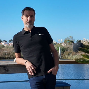 polo noir homme vue de face