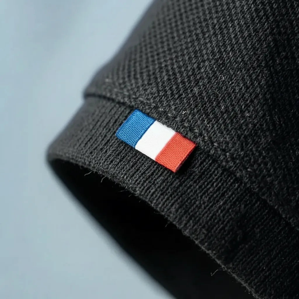 polo noir homme vue de la manche